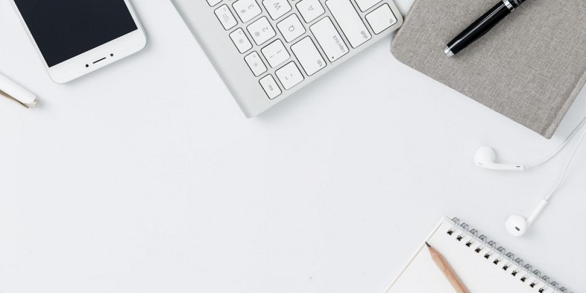 Photo of office supplies on desk.